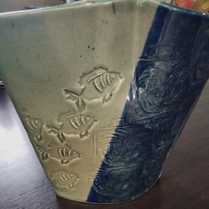 Vintage vase pottery with fish details and different color glazed by Mims